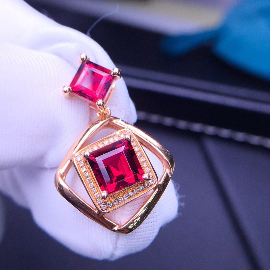 14K GOLD 3.5 CT NATURAL TOURMALINE & DIAMOND PENDANT: Title:14K GOLD 3.5 CT NATURAL TOURMALINE & DIAMOND PENDANT Description:Ref:230656463Gold Content:14K GoldMain Gemstone:TourmalineShape:SquareCarat Weight:3.5ct Color:RedTreatment:NaturalCut