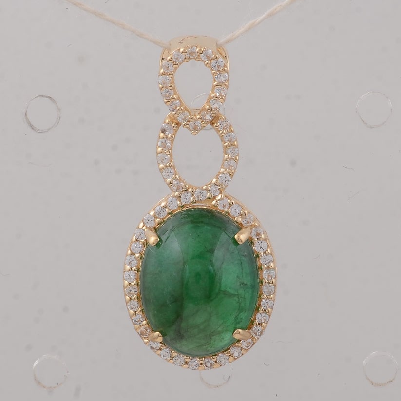 3.75 Ct Oval Emerald 9K Gold Pendant: 3.75 Total Carat Emerald 9K Gold Pendant Specifications: Total Weight 1.68 g Center Gemstone Emerald Gemstone Carat Weight 3.51 Carats Gemstone Measurements 10.50X8.50X5.70 mm Additional Gemstones
