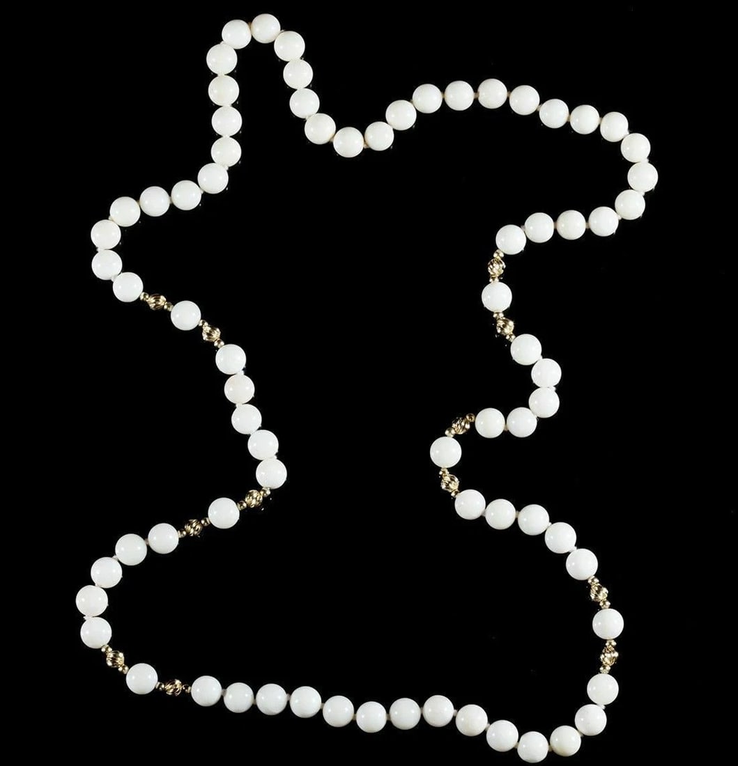 Angel Skin Coral and 14 kt Gold Necklace: Title:Angel Skin Coral and 14 kt Gold Necklace Description:Gorgeous light pink and white angel skin coral bead necklace. Circa 1950’s to 1960’s. Coral beads measure 8.5 mm’s in diameter. 14 kt