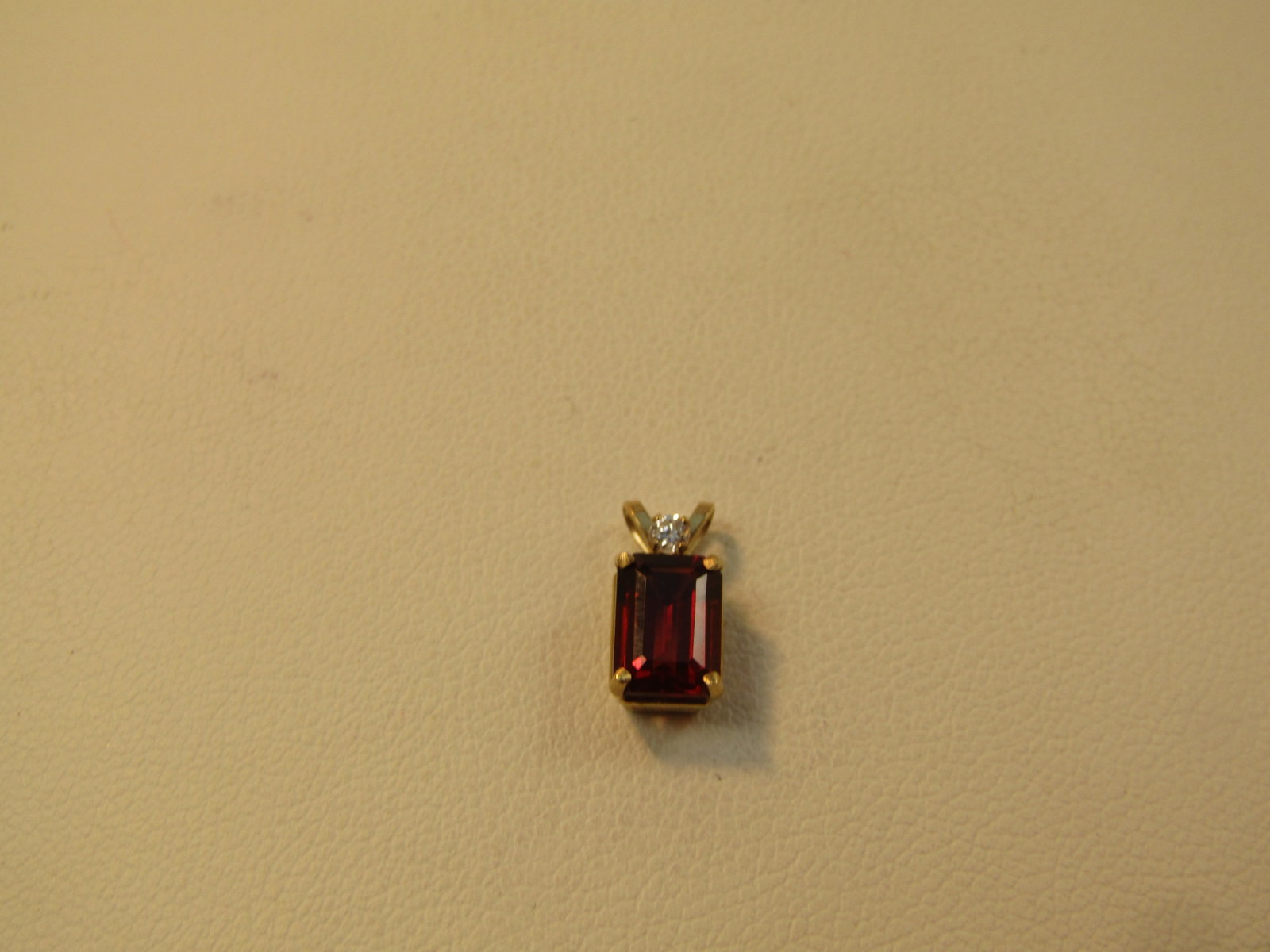 Vintage 10kt Garnet CZ Pendant, Signed, 1970's-1980's: Title:Vintage 10kt Garnet CZ Pendant, Signed, 1970's-1980's Description:Vintage 10kt Garnet CZ Pendant, Signed, 1970's-1980's. 10kt yellow gold with a garnet or tourmaline that is appx. 7mm by 5mm