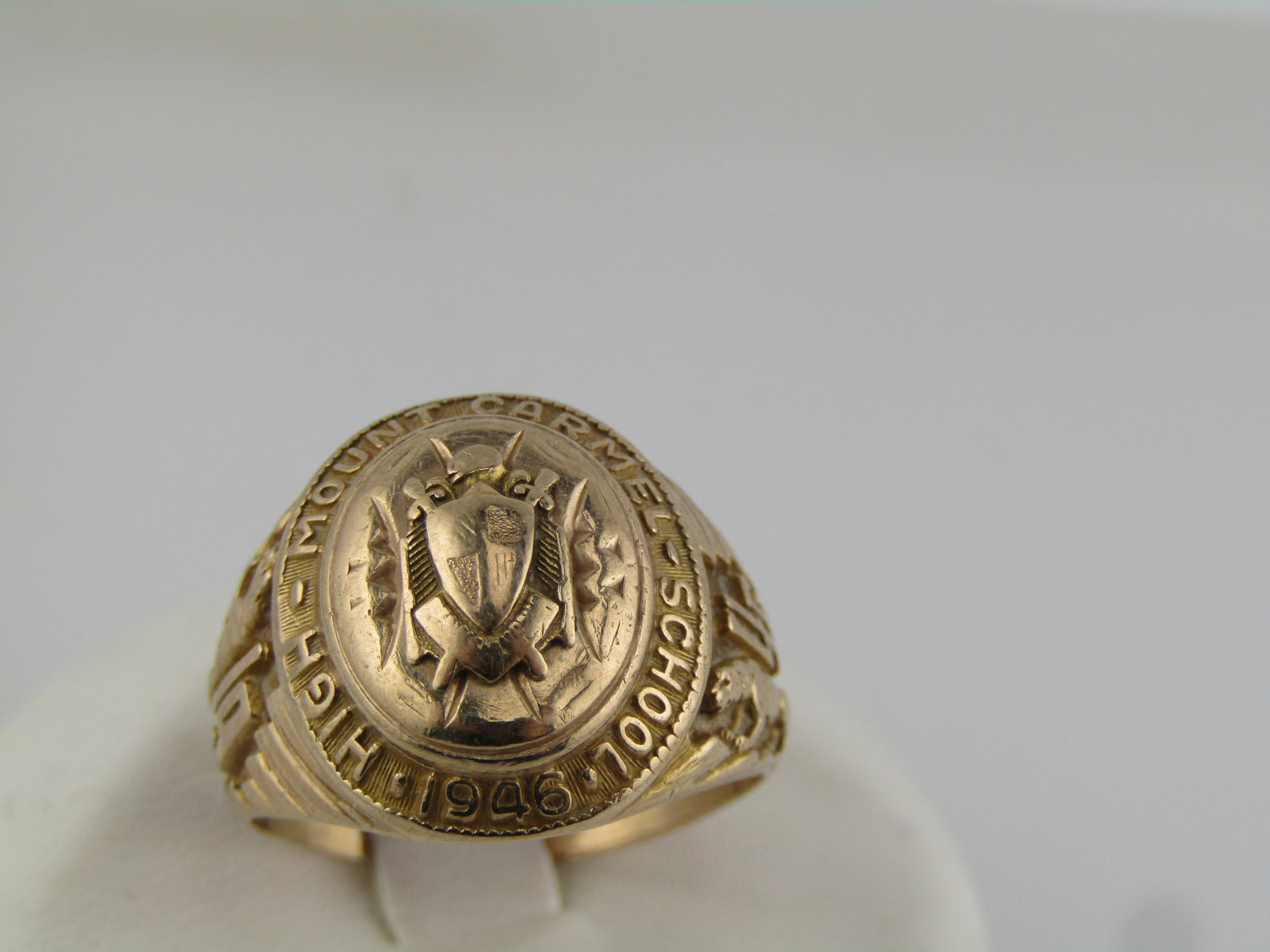 Vintage 10kt Mt. Carmel Class Ring. Sz. 8, 1946: Title:Vintage 10kt Mt. Carmel Class Ring. Sz. 8, 1946 Description:Vintage 10kt Mt. Carmel Class Ring. Sz. 8, 1946, This is all 10kt yellow gold, no stones. Weight is appx. 7.38 grams. It has a shield 