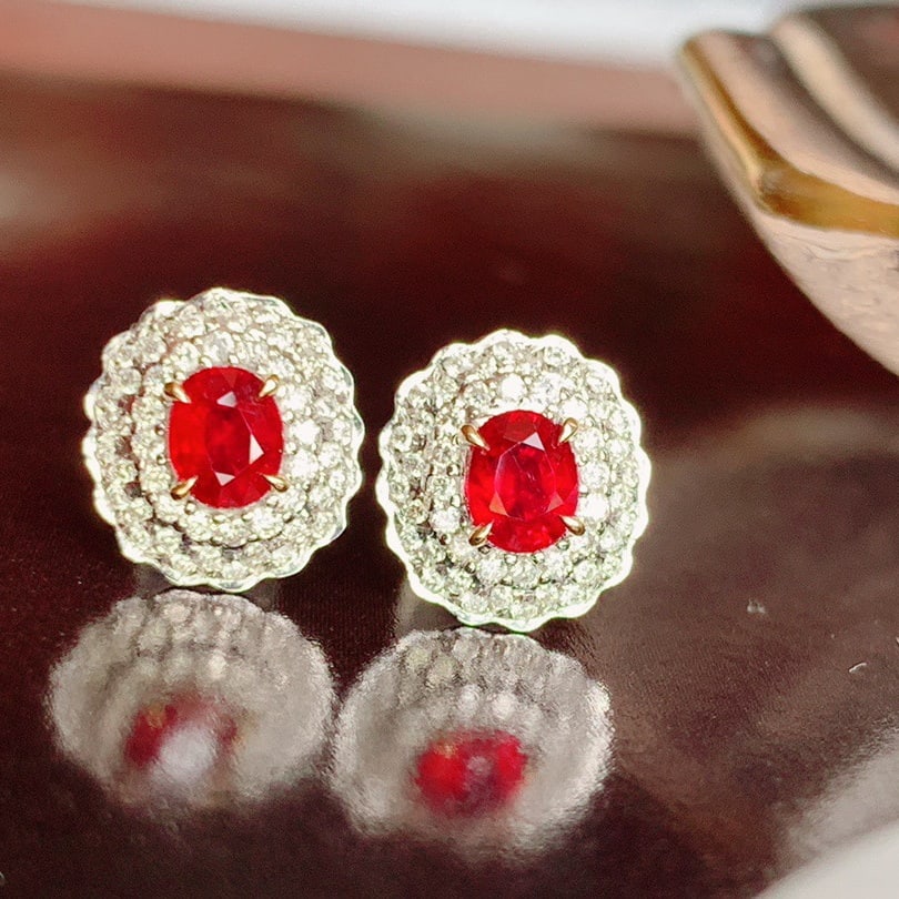 14K GOLD 0.73 CT NATURAL RUBY & DIAMOND EARRINGS: Title:14K GOLD 0.73 CT NATURAL RUBY & DIAMOND EARRINGS Description:Ref:230656424Gold Content:14K GoldMain Gemstone:RubyNumber of stones:2Shape:OvalCarat Weight:0.73ct Color:PigeonBlood RedTreatment:Na