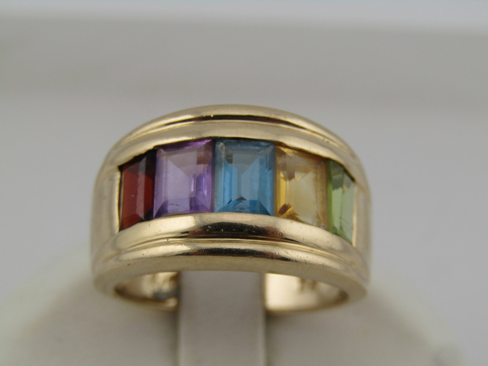 Vintage 10kt Mixed Gem Band Ring, Sz. 7, Signed, 1980's: Title:Vintage 10kt Mixed Gem Band Ring, Sz. 7, Signed, 1980's Description:Vintage 10kt Mixed Gem Band Ring, Sz. 7, Signed, 1980's. It appears to be A/ but not sure. It also has 54 marked on the
