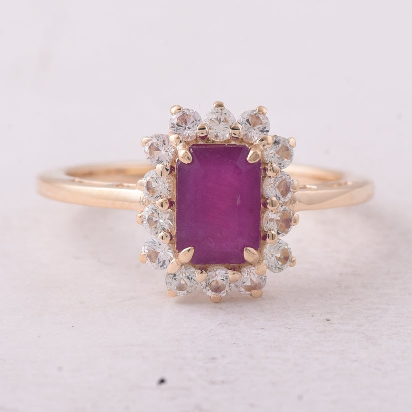 1.93 Ct Octagon Ruby 9K Gold Ring: 1.93 Total Carat Ruby 9K Gold Ring Specifications: Total Weight 2.471 g Center Gemstone Ruby Gemstone Carat Weight 1.32 Carats Gemstone Measurements 7.10X5.10X3.40 mm Additional Gemstones White