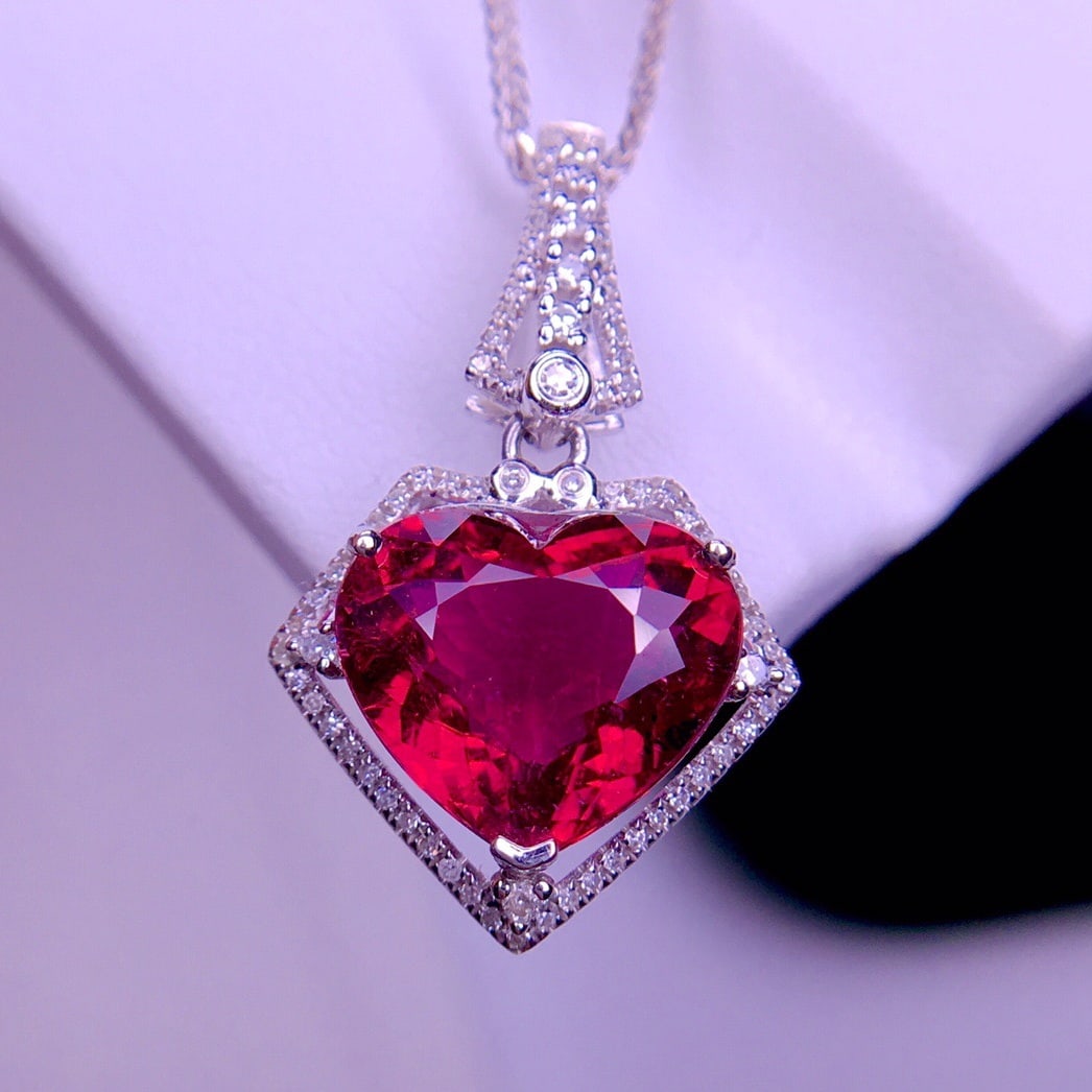 14K GOLD 4.5 CT NATURAL TOURMALINE & DIAMOND PENDANT: Title:14K GOLD 4.5 CT NATURAL TOURMALINE & DIAMOND PENDANT Description:Ref:230656420Gold Content:14K GoldMain Gemstone:TourmalineNumber of stones:1Shape:HeartCarat Weight:4.5ct Color:RedTreatment:Natu