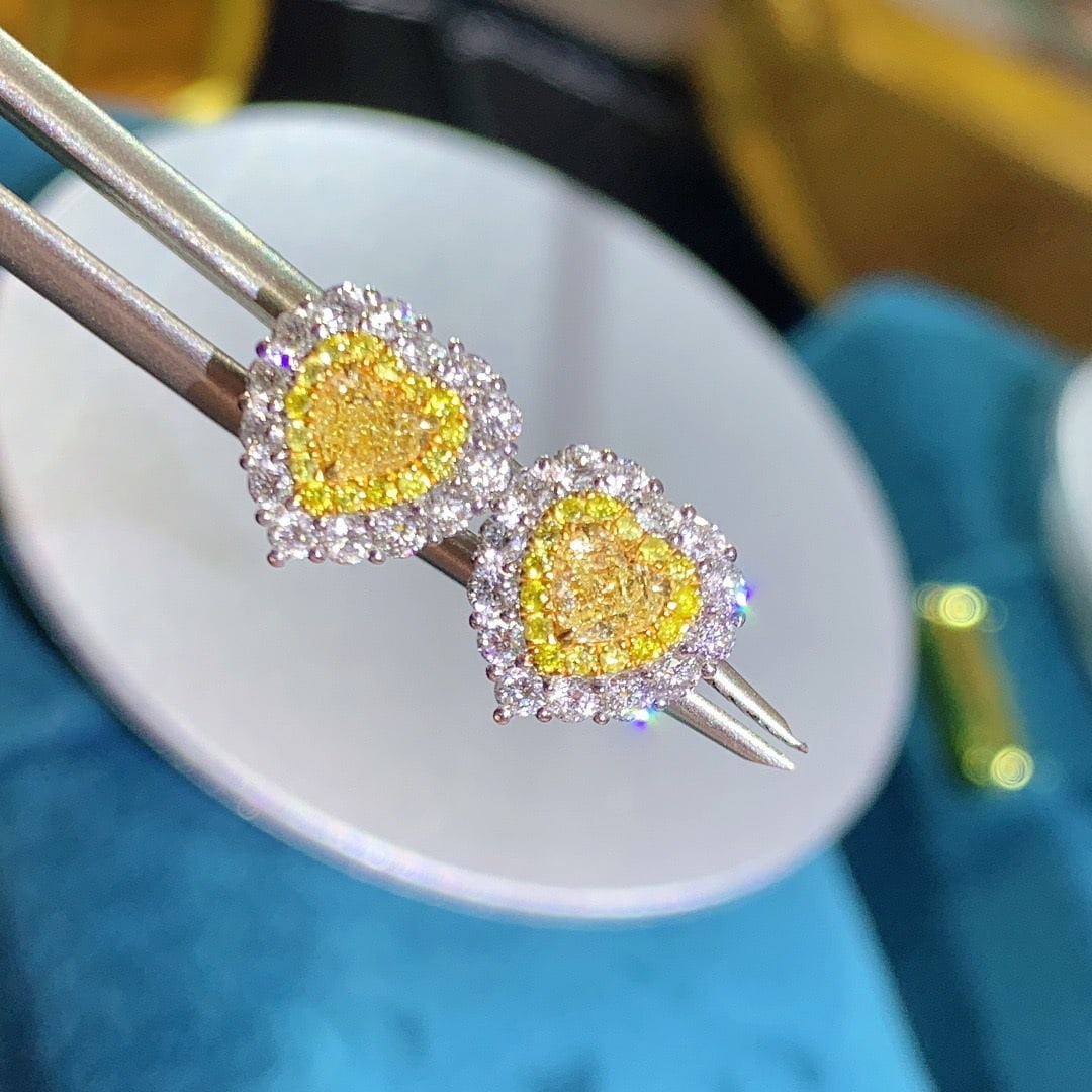 14K GOLD 0.95 CTW NATURAL YELLOW DIAMOND & DIAMOND EARRINGS: Title:14K GOLD 0.95 CTW NATURAL YELLOW DIAMOND & DIAMOND EARRINGS Description:Ref:230656415Gold Content:14K GoldMain Gemstone:Yellow DiamondNumber of stones:2Shape:HeartCarat Weight:0.37ct