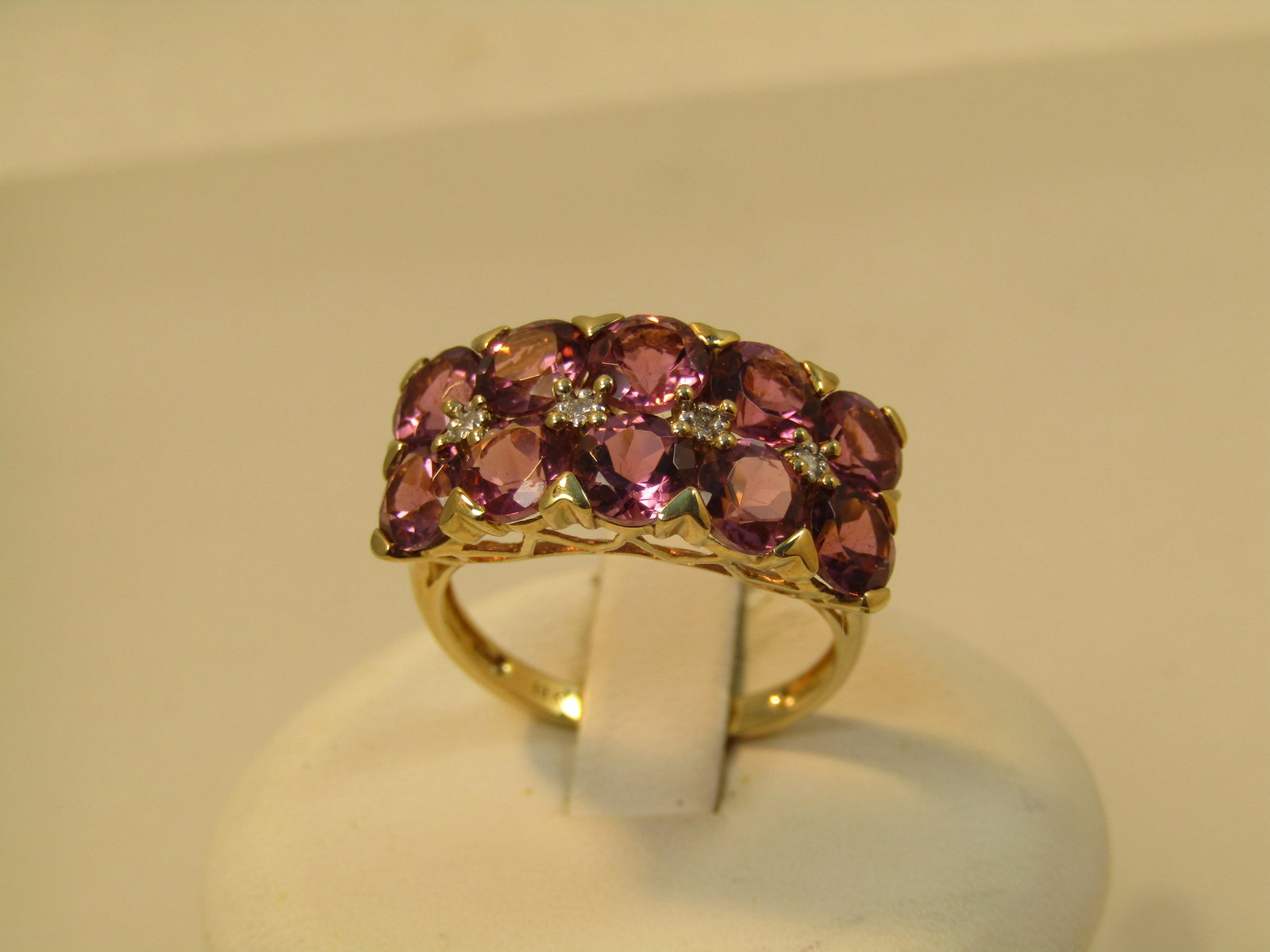 10kt Tourmaline Diamond Ring, Sz. 7.25, Signed CJ, 1980's-1990's: Title:10kt Tourmaline Diamond Ring, Sz. 7.25, Signed CJ, 1980's-1990's Description:10kt Tourmaline Diamond Ring, Sz. 7.25, Signed CJ, 1980's-1990's. This has two rows of five tourmalines that are