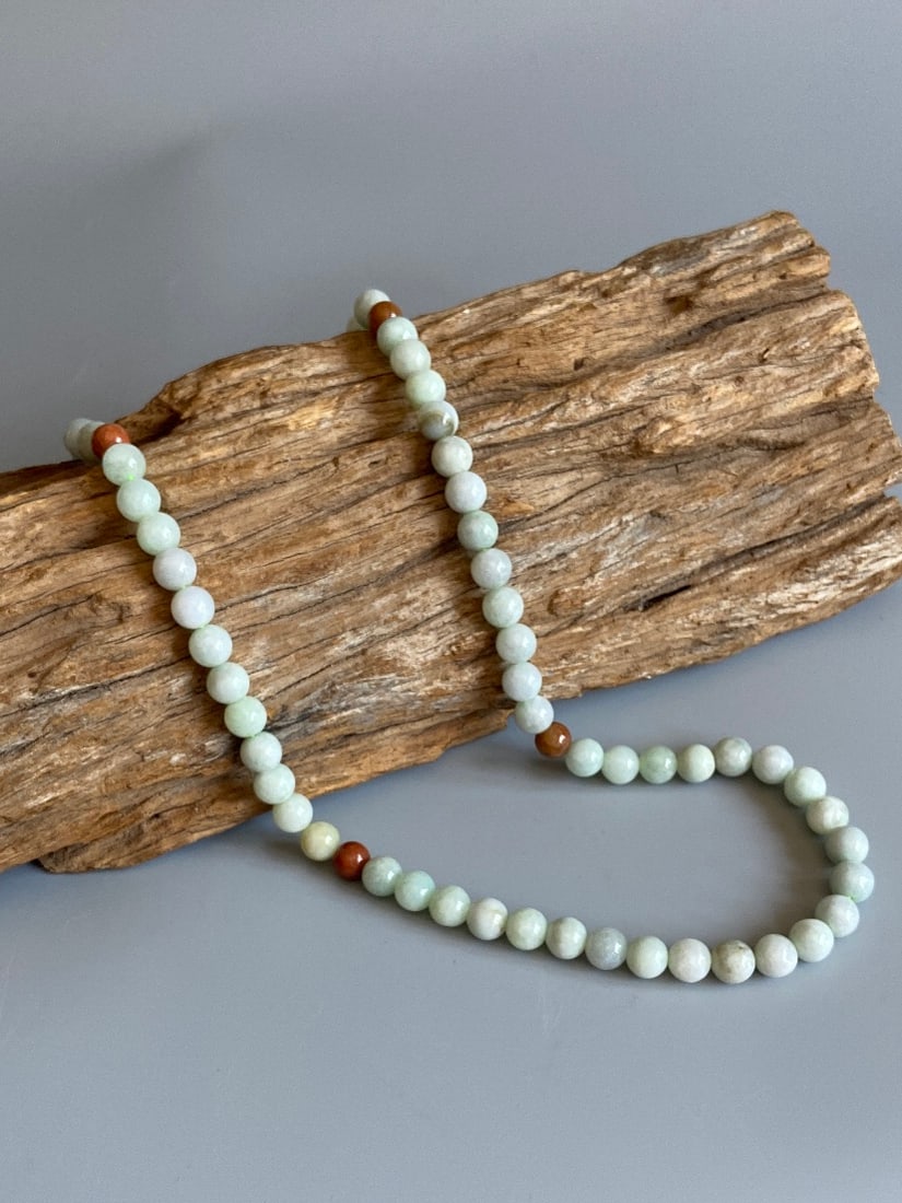 Genuine Jadeite Jade Beads Necklace: Title: Genuine Jadeite Jade Beads Necklace Description:Certified Natural Grade 8.5mm Icy Light Green and Yellow Jadeite Jade Bead Necklace 22inch Long This is a superb, vintage necklace of hand