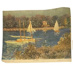 Monet Print, "The Seine Near Argenteuil": A color print of Claude Monet's "The Seine Near Argenteuil". The print depicts sailboats on a calm river with lush green banks and a small building in the distance. The impressionistic style captures