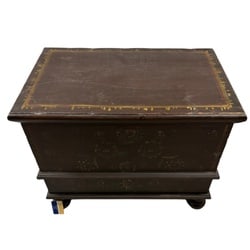 Hand-Painted Dark Wood Trunk/Chest: This charming trunk features hand-painted floral motifs on a dark brown, possibly mahogany or oak, base. The top surface displays a bordered design with golden accents, indicative of a rustic,