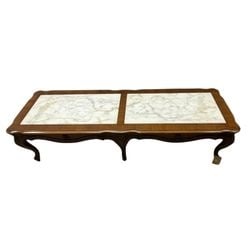 Italian Marble-Top Coffee Table with Ornate Carved Details: This elegant coffee table features a rectangular top composed of two polished marble slabs, displaying natural white and grey veining with hints of beige. The marble is set within a rich, warm-toned