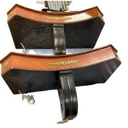 Pair of Edwardian Sconces with Faux Wood Grain and Gilt Accents: A pair of elegant Edwardian-style wall sconces, likely dating from the early 20th century. Each sconce features a faux wood grain finish on curved panels, adorned with molded gilt accents in the form