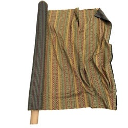 Roll of Southwestern Motif Upholstery Fabric: A substantial roll of upholstery fabric featuring a vibrant Southwestern-inspired motif. The pattern incorporates horizontal bands of geometric designs, including diamonds and zigzags, in a rich