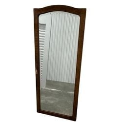 Carved Wood Arched Top Wall Mirror: A mid-20th century carved wood mirror, featuring an arched top and burled wood grain finish. The frame is simple yet elegant, adding a touch of classic sophistication. This piece is ideal for foyers,