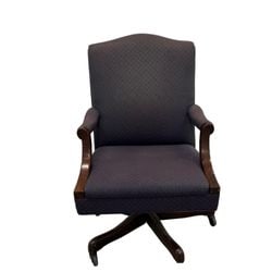 Traditional Style Upholstered Swivel Office Chair: This traditional style office chair features a high back and upholstered seat and back in a charcoal grey fabric with a subtle diamond pattern. The arms are gently curved and crafted from a rich,