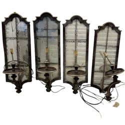 Set of Four Antique-Style Wall Sconces with Antiquarian Mirror Backs: A set of four elegant antique-style wall sconces, each featuring a heavily antiqued mirror back panel divided into four sections by dark mullions, giving the appearance of aged window panes. The