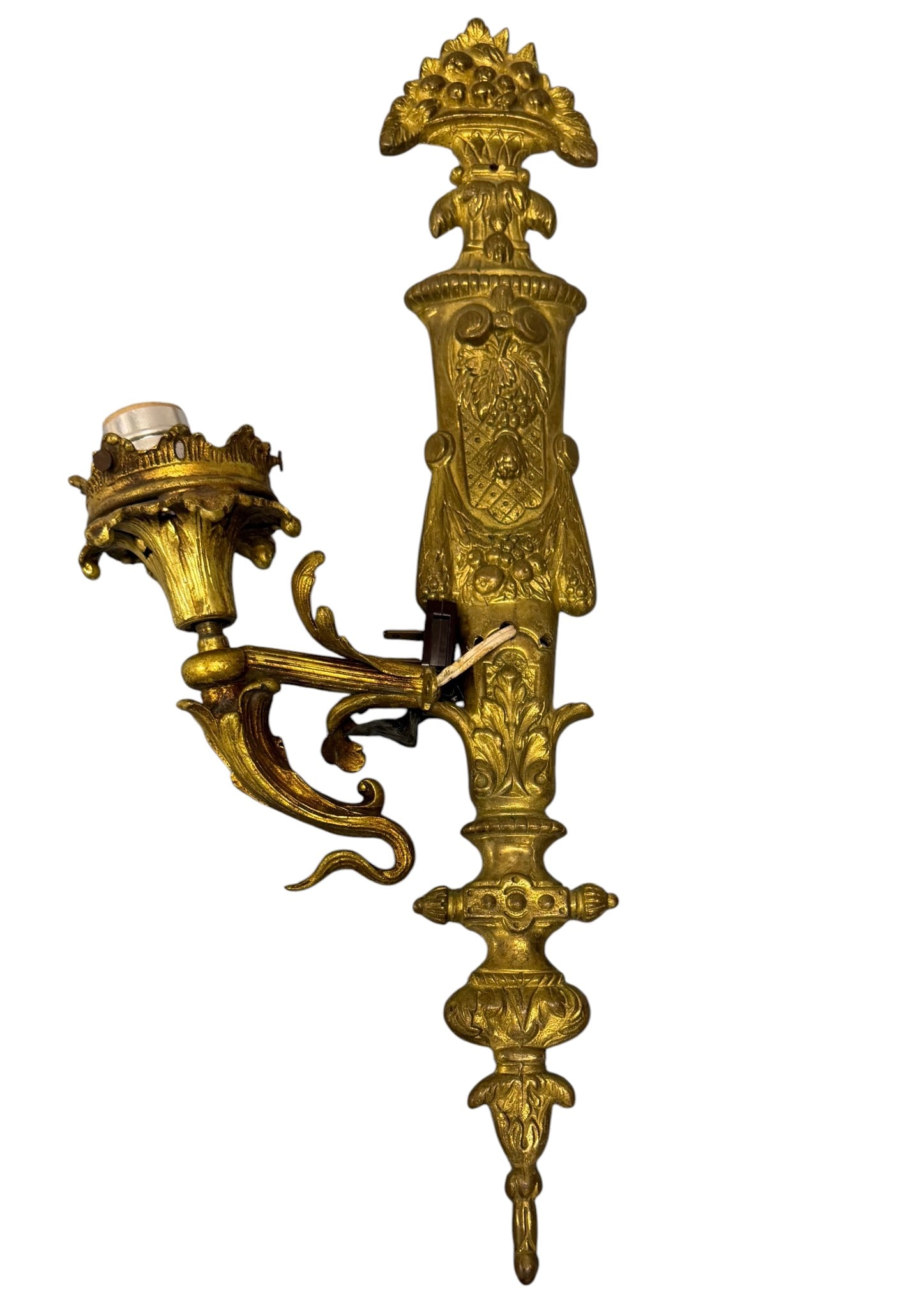 Gilt Bronze Sconce in the Rococo Style: A single gilt bronze sconce, likely from the late 19th or early 20th century, executed in the Rococo revival style. The backplate features an intricate design with elaborate scrollwork, acanthus