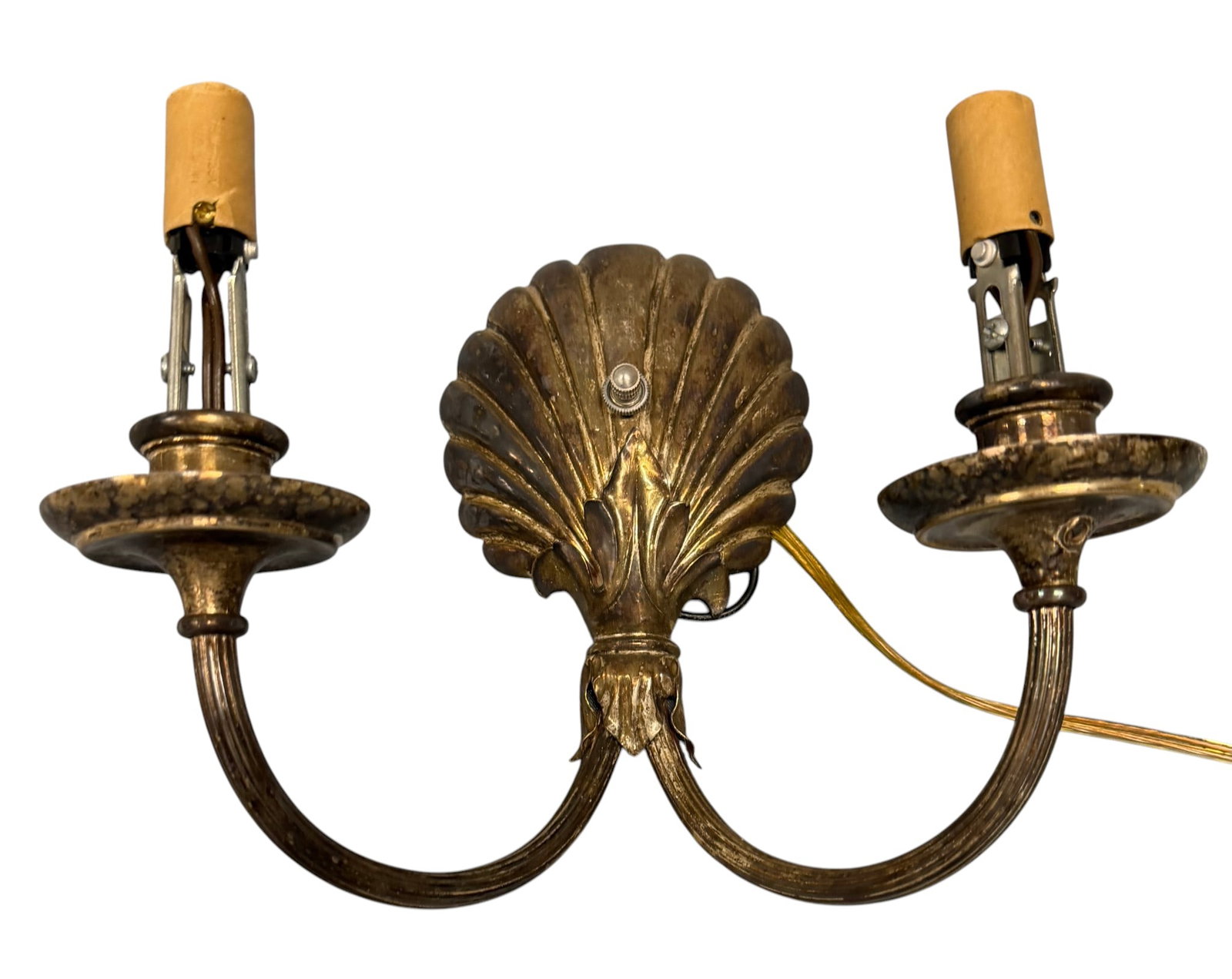 Pair of Vintage Art Deco Style Brass Wall Sconces: A pair of vintage Art Deco style brass wall sconces, likely dating from the mid-20th century. Each sconce features a central decorative backplate in the form of a stylized scallop shell, with a