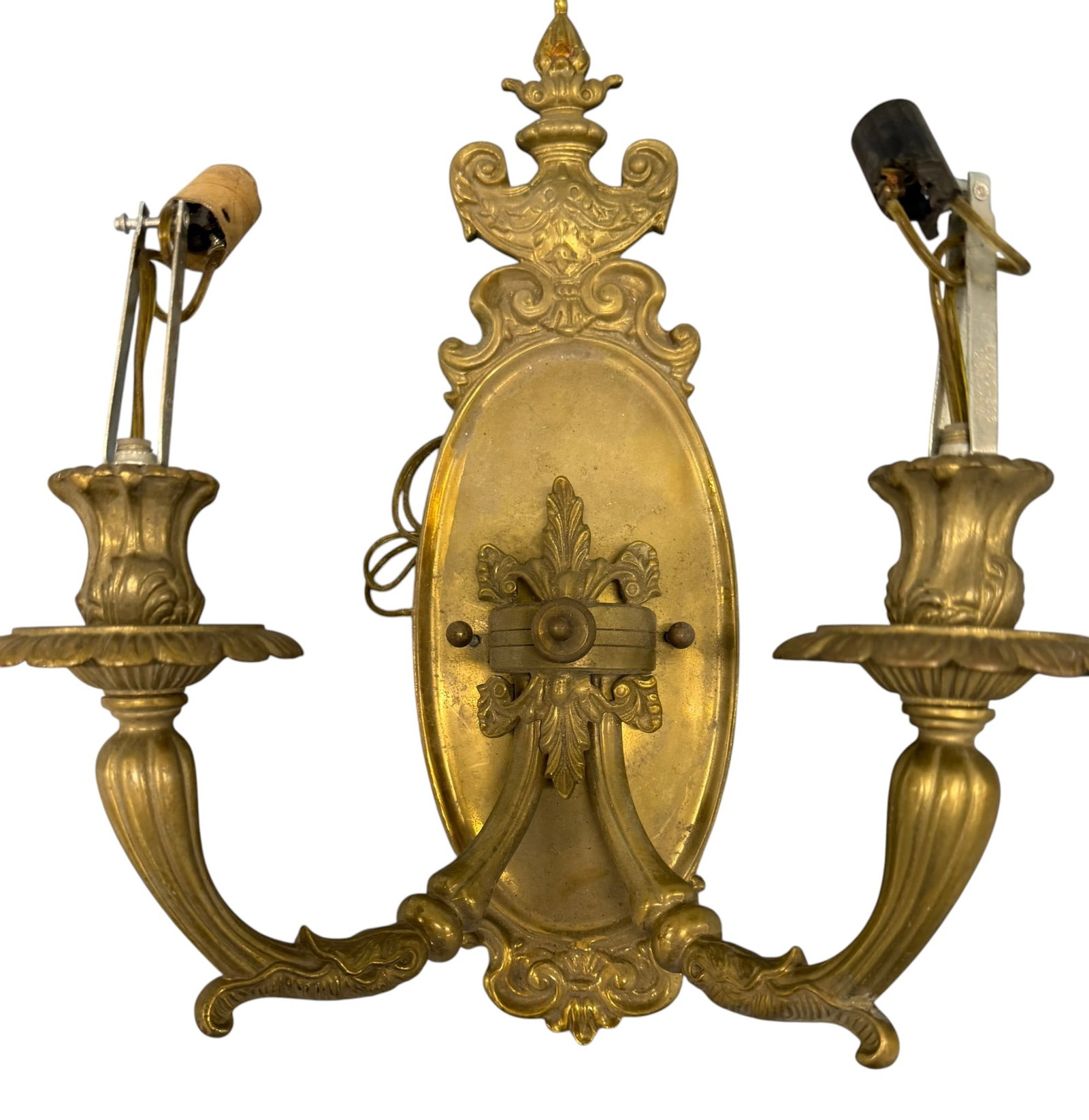 Gilt Bronze Rococo Style Two-Light Sconce: An ornate gilt bronze two-light sconce in the Rococo style, likely early 20th century. The central oval backplate features a decorative acanthus leaf motif, flanked by two scrolling arms terminating