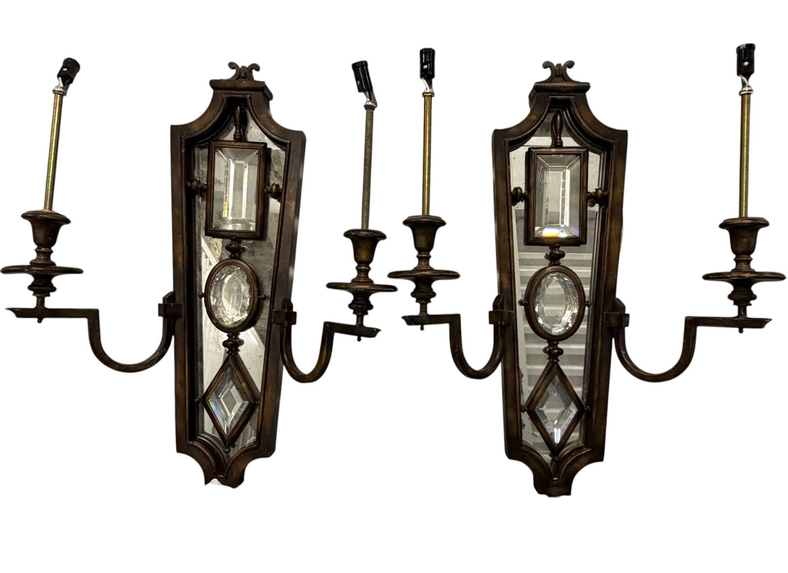 #4 Pair of Ornate Giltwood and Mirrored Sconces: A striking pair of giltwood wall sconces, likely early to mid-20th century, featuring an intricately carved frame with a distressed, antiqued gold finish. Each sconce is adorned with three mirrored