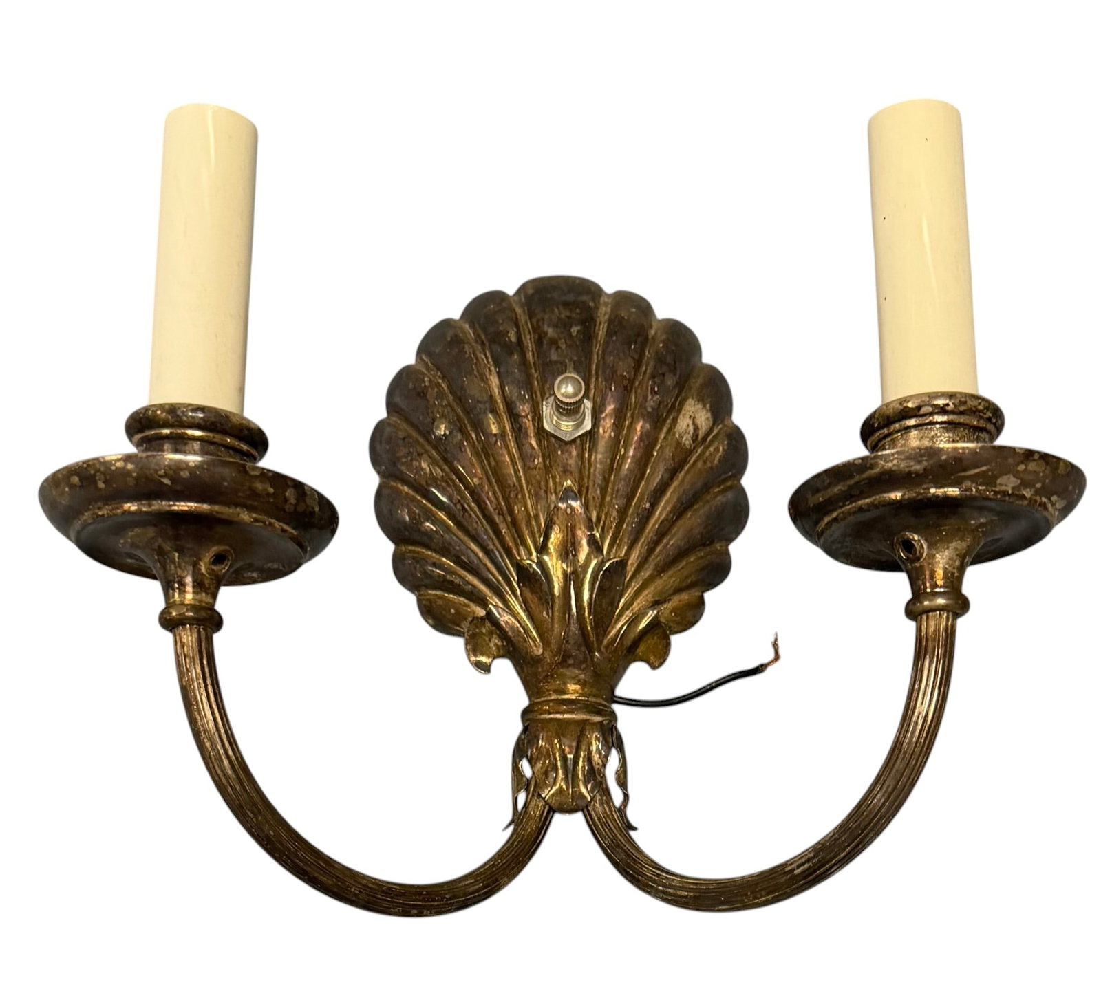 Pair of Vintage Brass Shell Motif Sconces: A charming pair of vintage brass sconces, each featuring a decorative shell-shaped backplate. The sconces are designed to hold two candelabra-style bulbs, reminiscent of traditional candle holders. Th