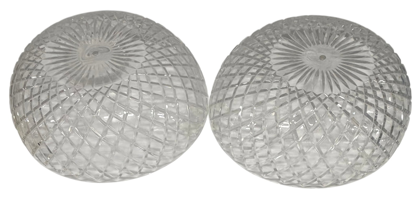 Pair of Cut Crystal Dome-Shaped Light Shades: This lot features a pair of dome-shaped light shades crafted from clear, cut crystal. Each shade exhibits a "hobnail" or diamond-cut pattern across its surface, creating a sparkling effect when light