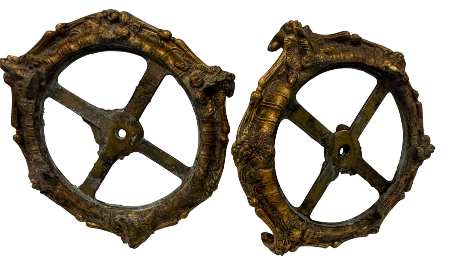 Pair of Ornate Gilt Bronze Rococo Style Mounts/Appliques: A distinctive pair of gilt bronze mounts or appliques, crafted in the Rococo style, likely dating from the late 19th or early 20th century. Each piece features an asymmetrical, curvilinear frame