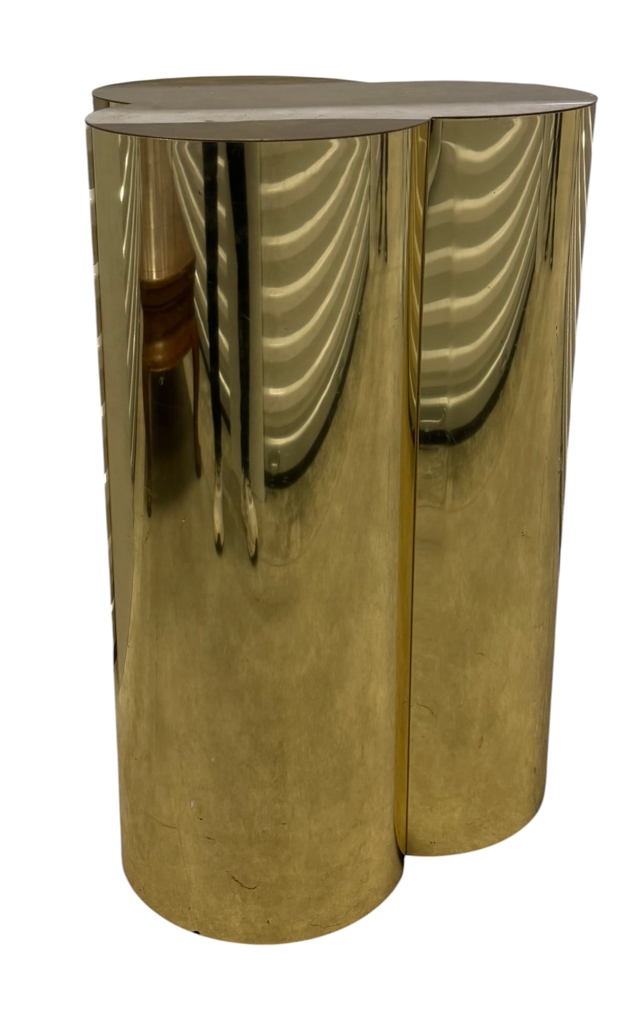 Polished Brass Triple Cylinder Plinth Pedestal, Mid-20th Century: This striking mid-20th century pedestal features three polished brass cylinders fused together, creating a clover-like form when viewed from above. The clean lines and reflective surface are
