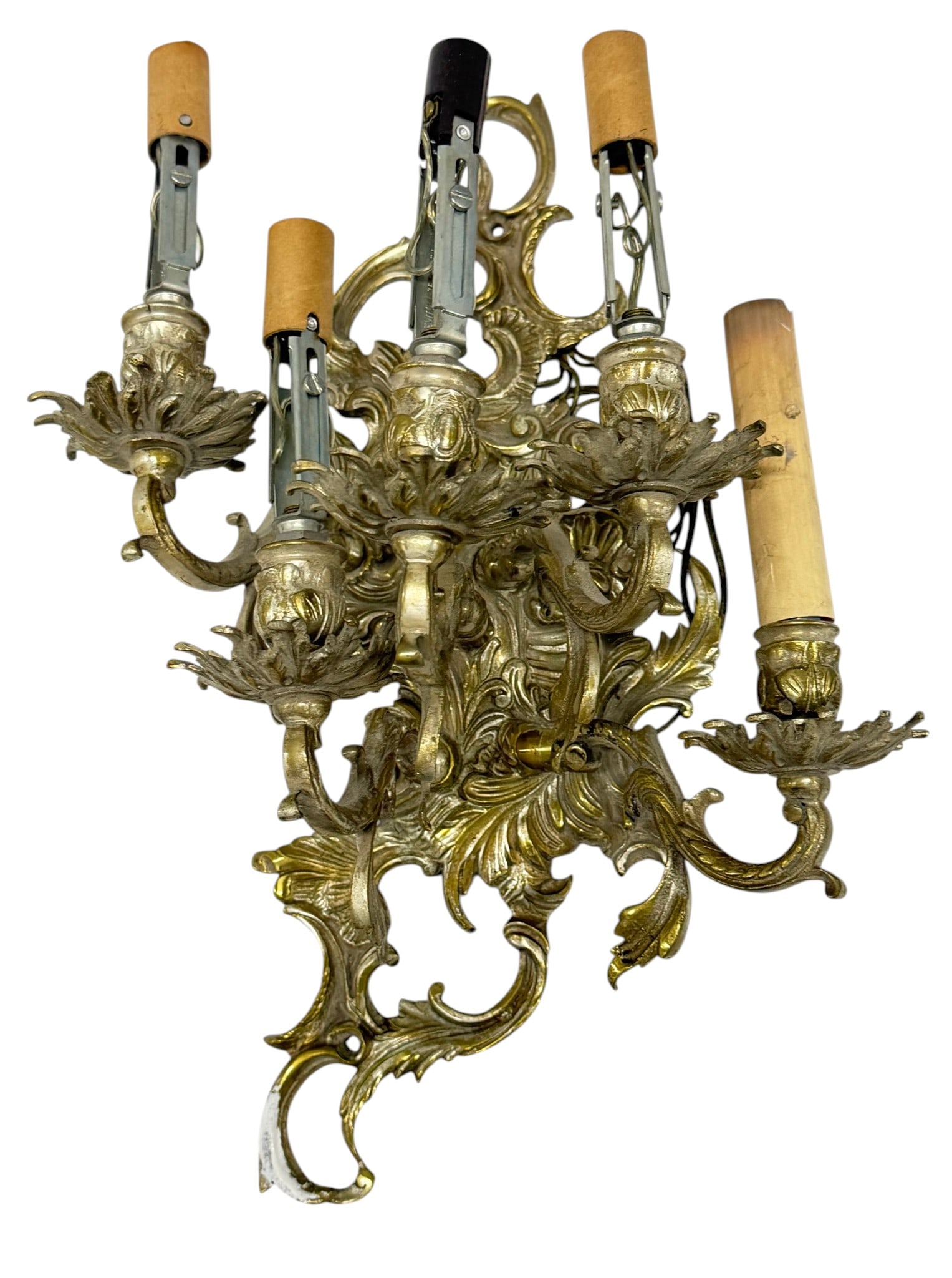 ornate Rococo style brass sconce: An ornate Rococo-style sconce crafted from brass, featuring elaborate scrolling acanthus leaves, C-scrolls, and floral motifs. The sconce has five arms, each terminating in a candelabra-style light