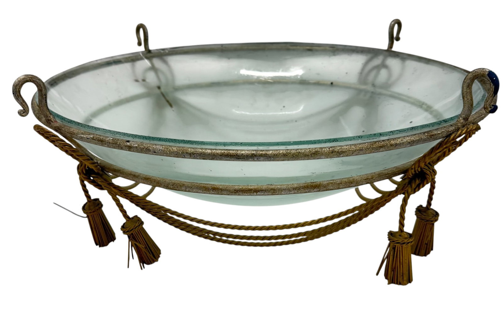 Decorative Glass Bowl in Ornate Rope-Wrapped Metal Stand: A visually appealing decorative glass bowl set in an ornate metal stand, likely from the late 20th to early 21st century. The bowl itself is clear, thick glass with a slightly greenish tint, suitable