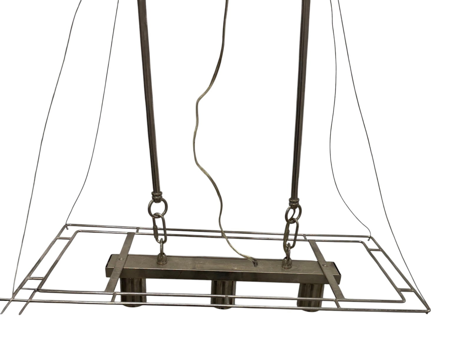 Mid-Century Modern Stainless Steel Chandelier: This mid-century modern chandelier is crafted from stainless steel with a minimalist and industrial design. It features a rectangular frame supporting three downward-facing cylindrical lights,