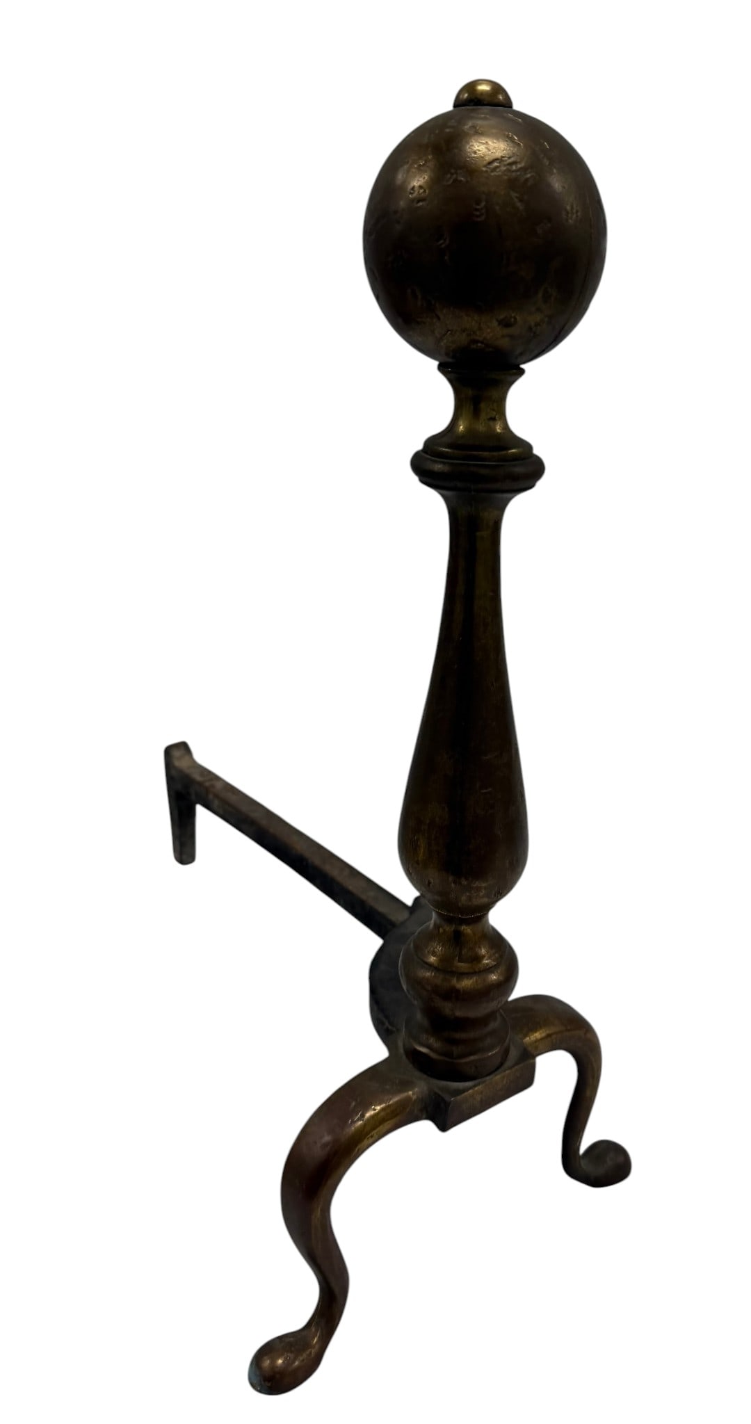 Antique Brass Ball-Top Andirons, 19th Century: A single antique brass ball-top andiron, likely dating from the 19th century. This elegant fireplace accessory features a classic design with a prominent spherical finial atop a turned columnar