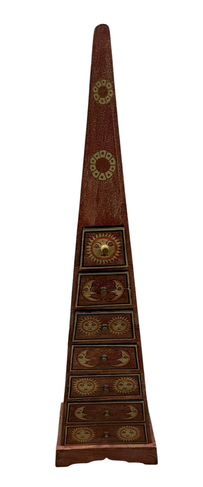 Hand-Painted Folk Art Sun and Moon Pyramid Cabinet: A whimsical hand-painted folk art cabinet, pyramid-shaped, featuring celestial motifs of the sun and moon. The cabinet is constructed from wood with a distressed reddish-brown finish, accented with