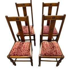 Set of Four English Jacobean Style Oak Dining Chairs and a Pair of Regency Style Cane-Back Side: This lot presents a diverse collection of dining and side chairs. The first set comprises four English Jacobean style dining chairs, crafted from solid oak. These chairs feature a classic design with 