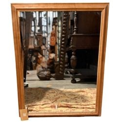 Contemporary Blonde Wood Framed Wall Mirror: A contemporary wall mirror featuring a simple blonde wood frame with a clean, minimalist design. The frame is constructed from light-toned wood, likely pine or maple, with a clear finish that