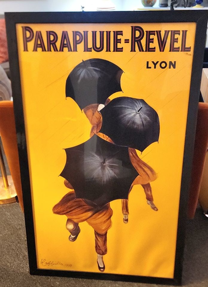 Vintage 24x38 print of iconic French ad poster, "Parapluie-Revel," by Italian artist Leonetto: Facsimile signed print of the iconic French advertising poster, "Parapluie-Revel," created by the Italian artist Leonetto Cappiello (1875-1942), often called "the father of modern advertising" due to 