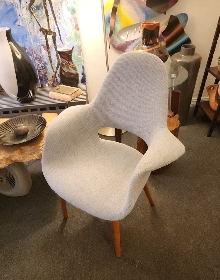 Stylized Mid-Century Modern Chair: This stylized mid-century modern chair was part of The Organic Chair collection which was developed in several versions for the 1940 'Organic Design in Home Furnishings' competition organized by the M