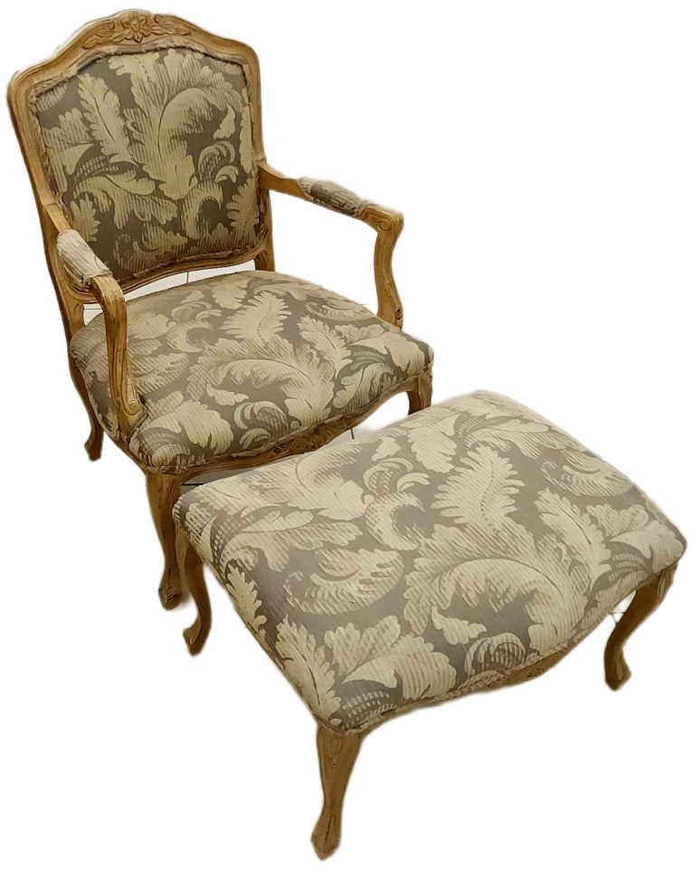 From Italy.. Rare Antique or Vintage Louis XV Style Armchair & Ottoman Set: Elegant Louis XV style armchair and matching ottoman set. Has a beautiful carved wooden frame with a distressed finish. Upholstery is a wonderful patterned fabric in light beige and muted gray tones. 