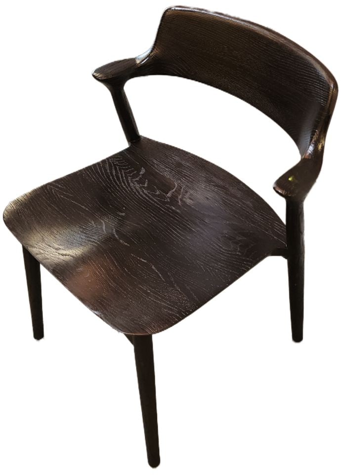 A Black Iconic Wood Oskar Side Chair Danish Designed from Restoration Hardware: According to Restoration Hardware this chair is a tribute to Danish design, marked by its fluid, modernist form and sculptural sensibility. And very comfortable. Reserve: $300.00 Shipping: Domestic: S