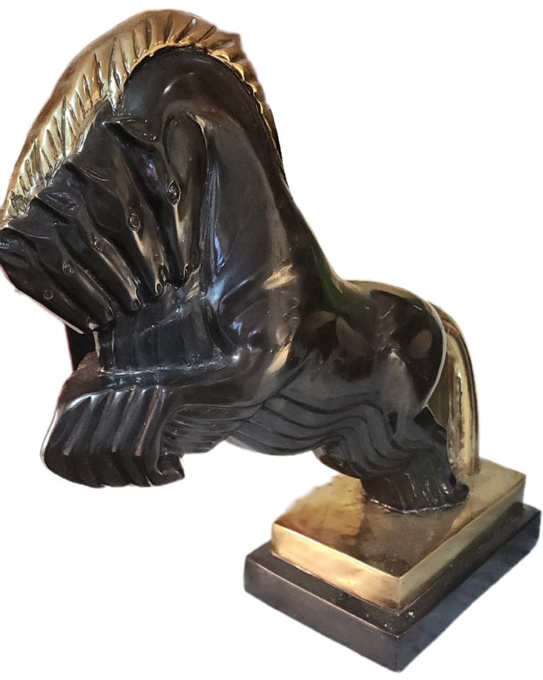 Striking bronze mid-century deco style sculpture of leaping horse w/ multi-imagery to create motion: Rare elegant bronze horse sculpture. Has a beautiful dark patina with gold accents on the mane, tail, and base. Art Deco style. A real collector item. Perfect for any decor. Reserve: $2,500.00 Shippin