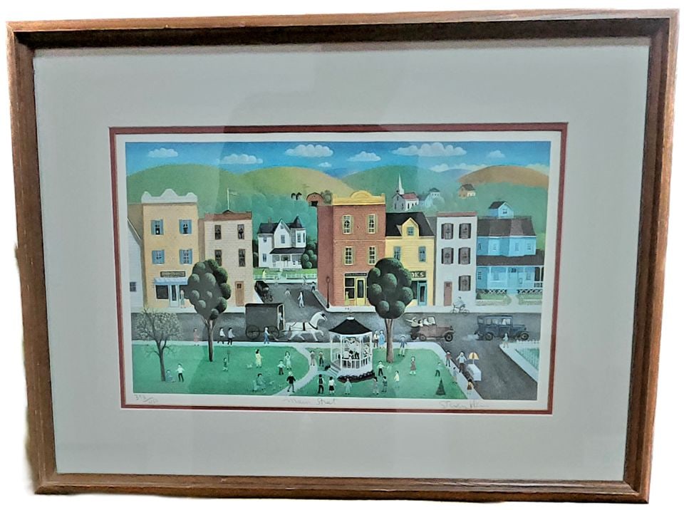 Steven Klein, a vintage Ltd Edition signed print 398/450 titled Main Street framed under glass.: Steven Klein is known for his Americana folk art style and primitive imagery. Steven Klein is a well-established American Artist whose works have been offered at Bonham's any other auction houses. Inf