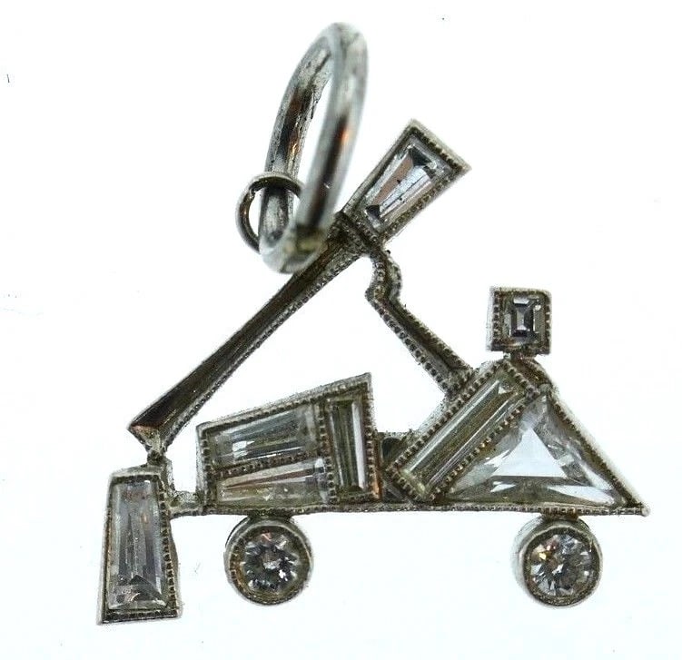 Platinum Diamond Truck Charm: Title: Platinum Diamond Truck Charm Description: Fine Jewelry, Arts & AntiquesNS RT0Cute platinum diamond Truck charm Measurements: 1/2"H x 9/16" W Weight is 1.3 grams In excellent condition; wear