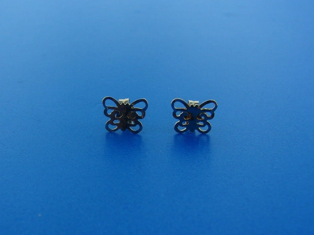 TINY ADORABLE 14 K YELLOW GOLD BUTTERFLY EARRINGS: Title: TINY ADORABLE 14 K YELLOW GOLD BUTTERFLY EARRINGS Description: Fine Jewelry, Arts & AntiquesPurveyors and Purchasers ofAntique and Estate Pieces EARRINGS 14K YELLOW GOLD BUTTERFLY WEIGHT - 0.5