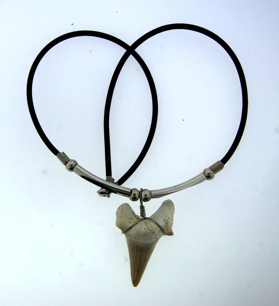 UNIQUE VINTAGE C.1960 NATURE NECKLACE LEATHER CORD PENDANT STAINLESS METAL: Title: UNIQUE VINTAGE C.1960 NATURE NECKLACE LEATHER CORD PENDANT STAINLESS METAL Description: Fine Jewelry, Arts & AntiquesPurveyors and Purchasers ofAntique and Estate Pieces N-JOO "TOOTH" PENDANT