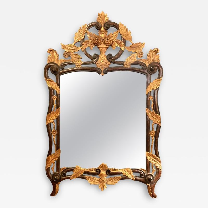 French Regency Antique Mirror of Mahogany and Gilt with Basket of Roses Design: Title: French Regency Antique Mirror of Mahogany and Gilt with Basket of Roses Design Description: Description 1: French Regency antique mirror of mahogany and gilt with basket of roses design. The