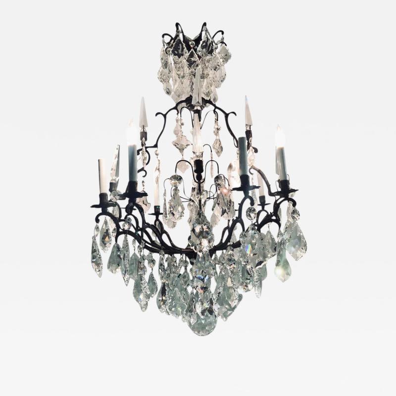 Versailles Chandelier with Swarovski Strass and Crystal Pendants: Title: Versailles Chandelier with Swarovski Strass and Crystal Pendants Description: Description 1: Versailles chandelier with Swarovski Strass and crystal pendants having a dark brownish almost black