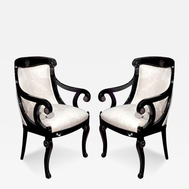 Pair of Hollywood Regency Style Ebonized Armchairs: Title: Pair of Hollywood Regency Style Ebonized Armchairs Description: Description 1: Pair of Napoleon style ebonized fauteuils, 20th century, each with domed back and scrolled arms, padded back and s