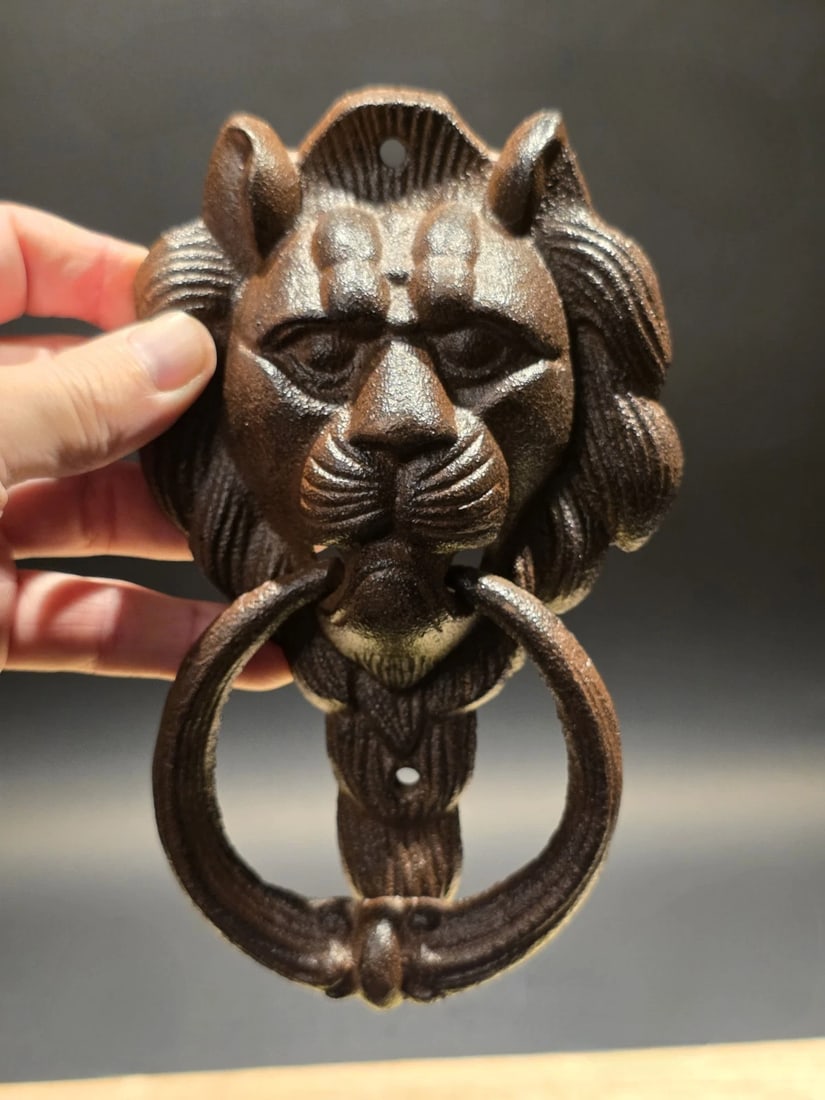 7" Lion Head Cast Iron Door Knocker: 7" x 5" Reproducion Lion Head Cast Iron Door Knocker Inspired by Victorian and Colonial-era architectural hardware, this door knocker features a high-relief "King of Beasts" design that brings a sense