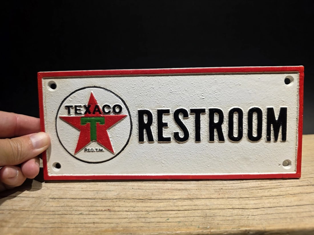 Cast Iron Texaco Restroom Sign Plaque: 10 L x 4 H Wonderful reproduction cast iron Texaco restroom sign featuring the iconic five-pointed star of the Texas Company, often found in garages, workshops, or man caves. 100% Customer