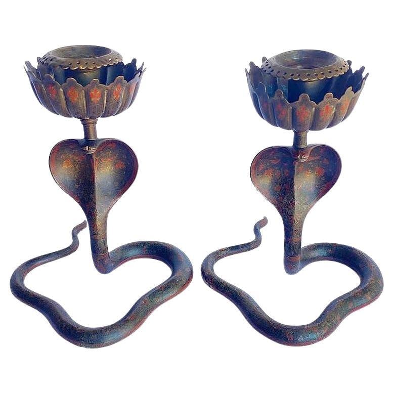20th Century Hand etched Persian Cobra Brass and Bronze Candle Holders, pair: Title: 20th Century Hand etched Persian Cobra Brass and Bronze Candle Holders, pair Description: A striking pair of Persian Hand etched cobra candle holders crafted in solid Brass and bronze. Each